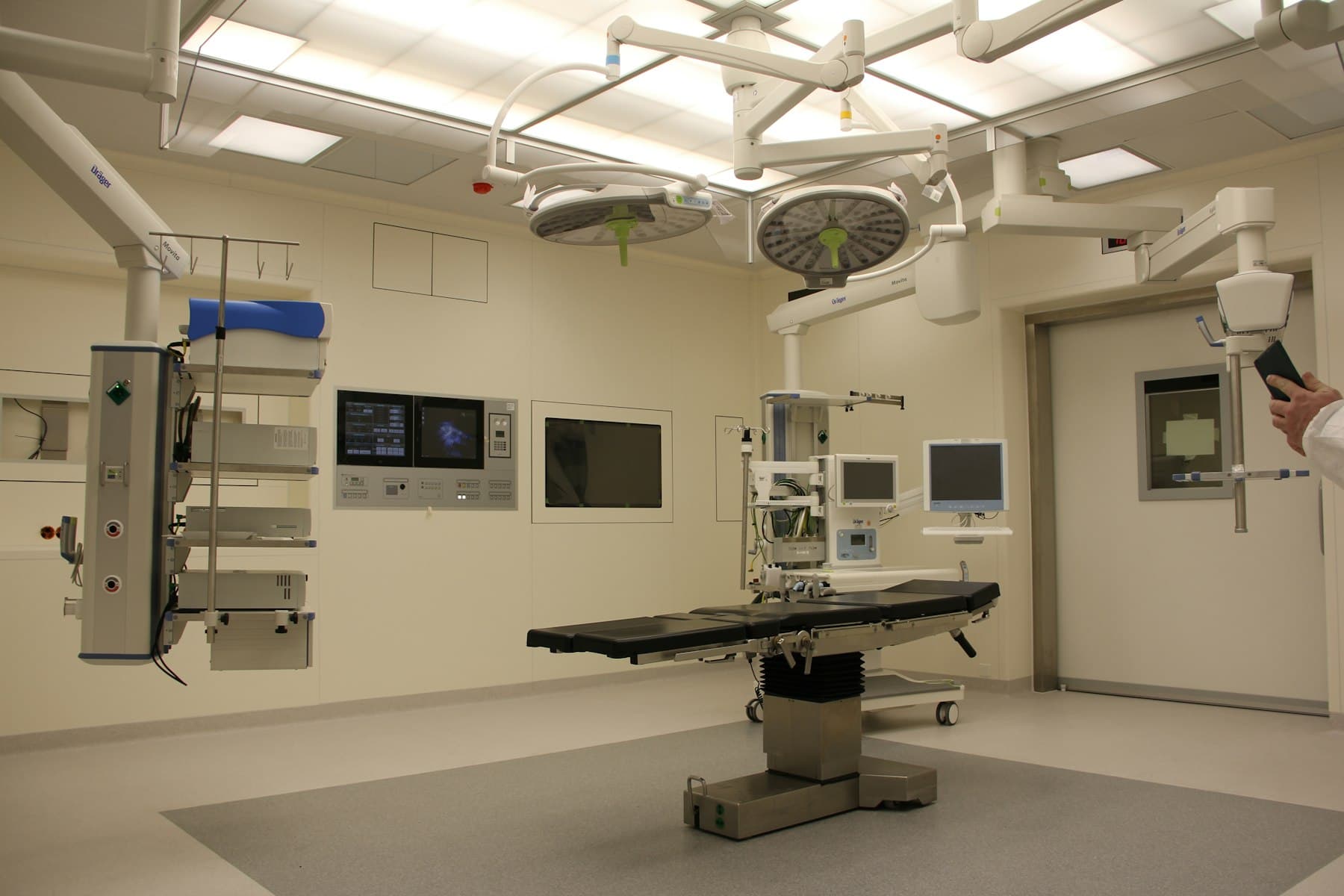 A hospital corridor after the visit — the chart still has to close